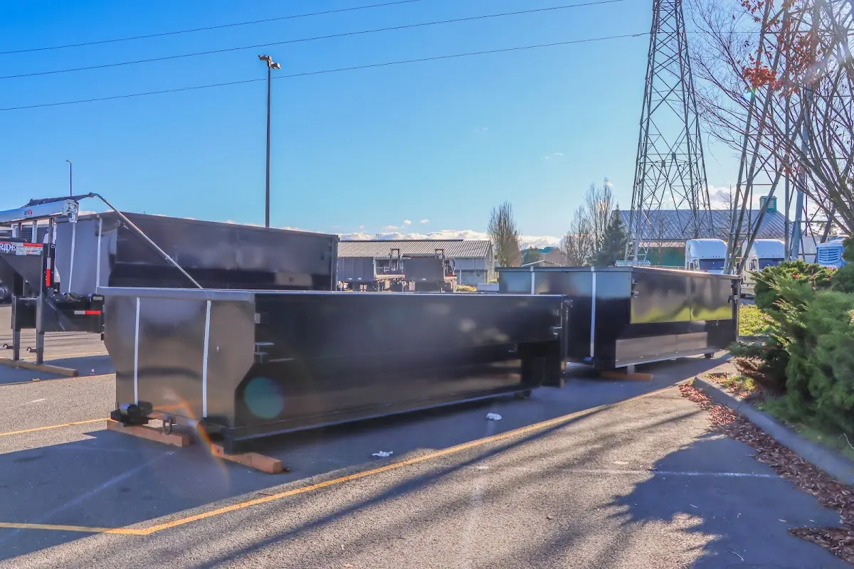 Roll-off dumpster ready for waste disposal at job site for Estate Cleanout Dumpster Rental in River Edge